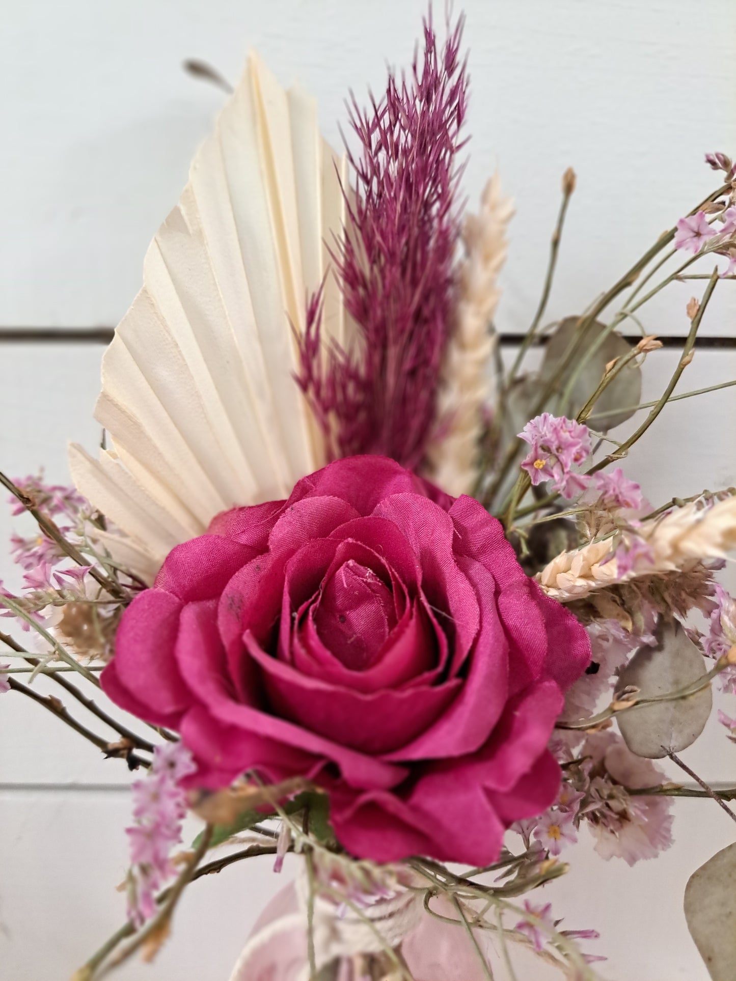 Petit bouquet nature et baie avec vase