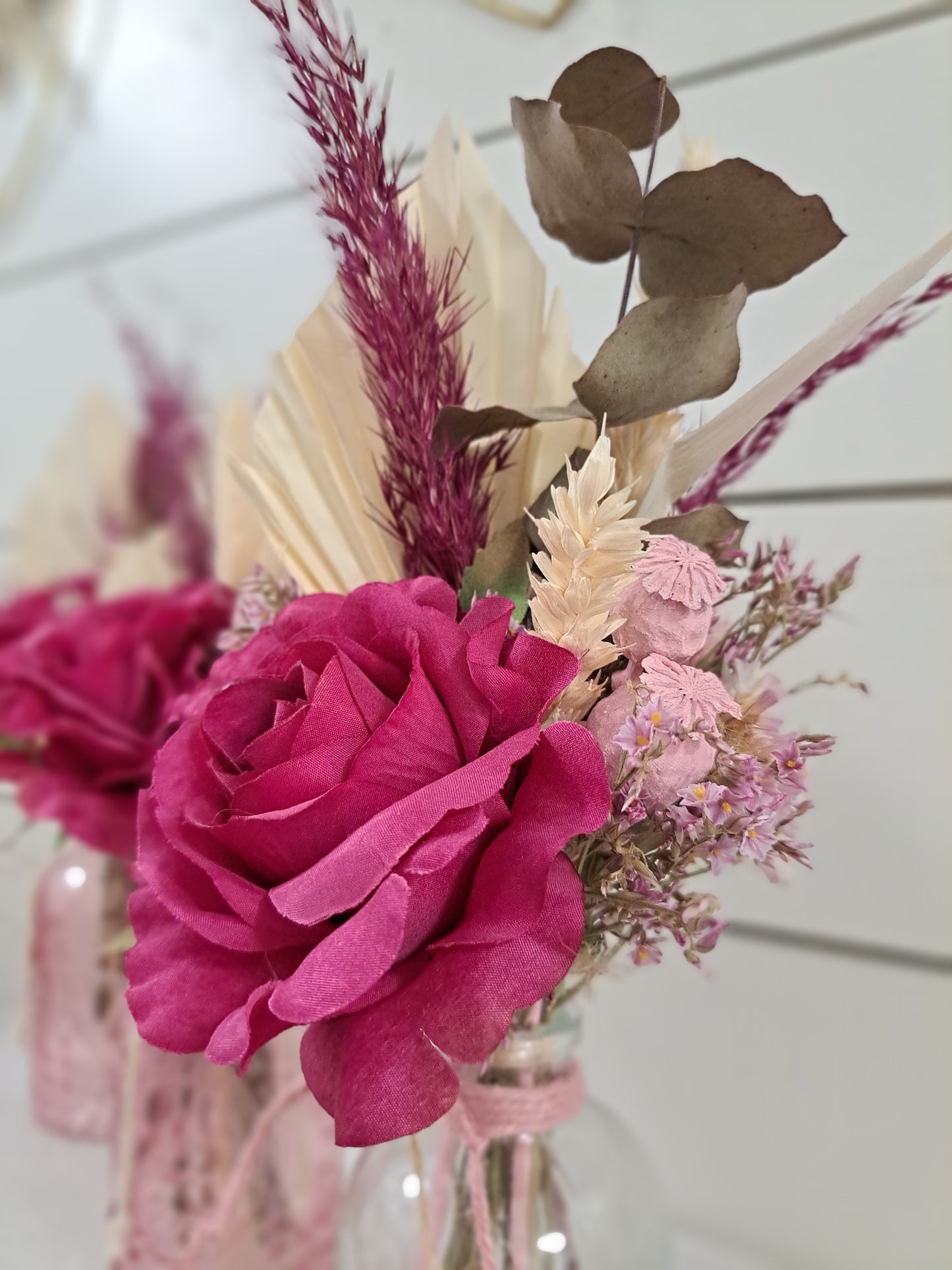 Petit bouquet nature et baie avec vase